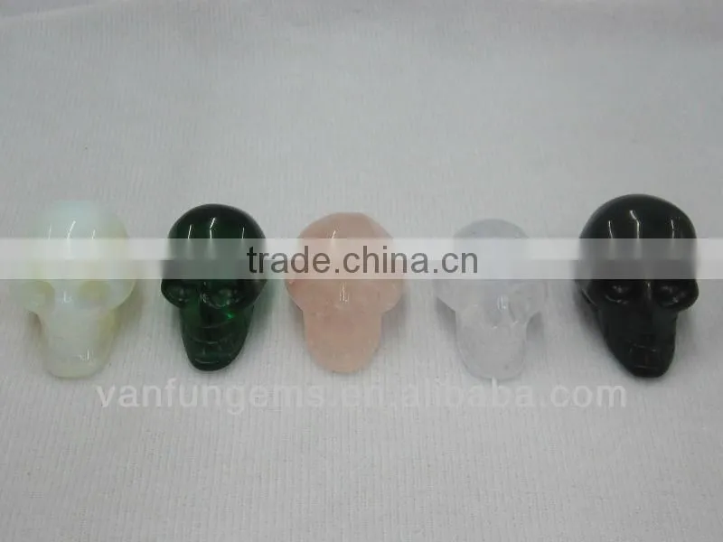 Different size color White Opal gemstone skull