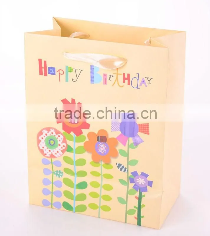 Kids birthday party gift paper bag with ribbon handle