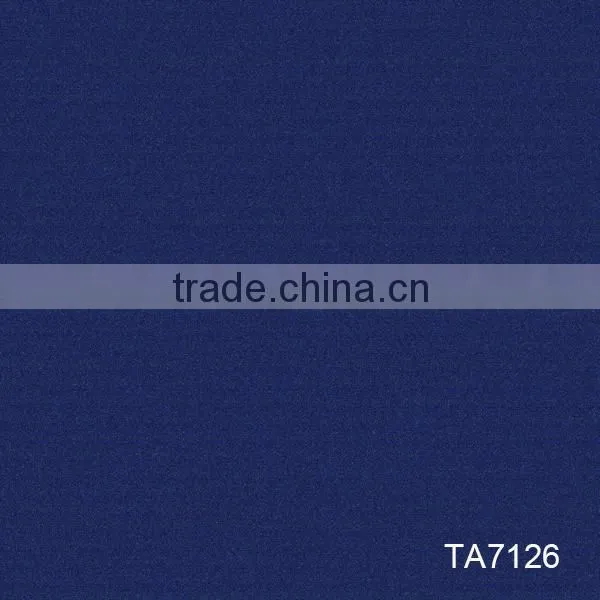 Level loop commercial carpet tile with PVC backing