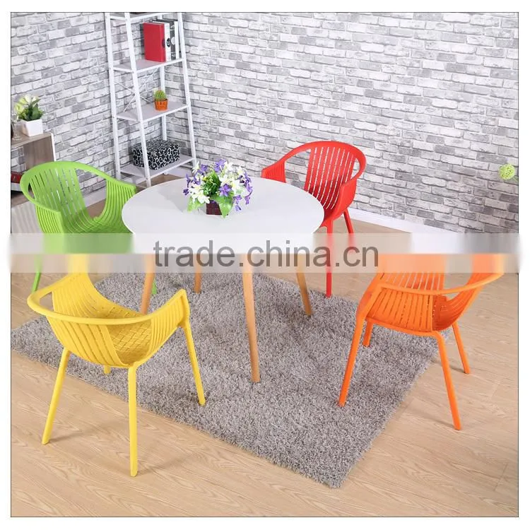 Plastic dining chair with armrests for sale