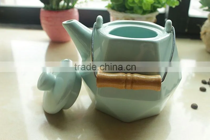 Customize logo porcelain chinese tea pot with steel handle