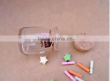 Heart shaped glass bottle with cork