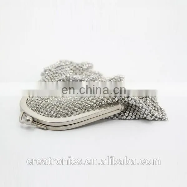 CR Korean designer developed shining diamonds surface skirt design metal frame fancy elegant indian clutch purses wholesale