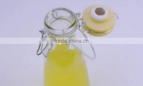 Wholesale beverage glass bottles glass juicer bottle with swing top lids