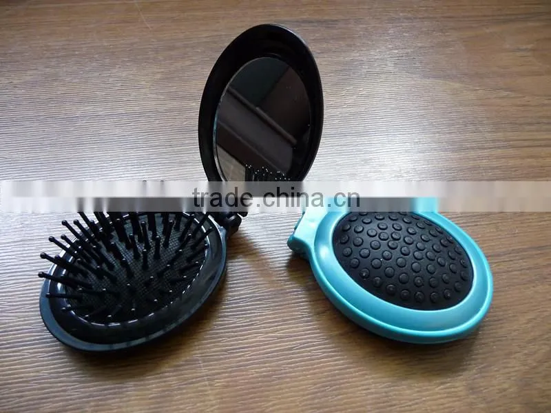 Plastic foldable oval shape makeup folding comb with mirror