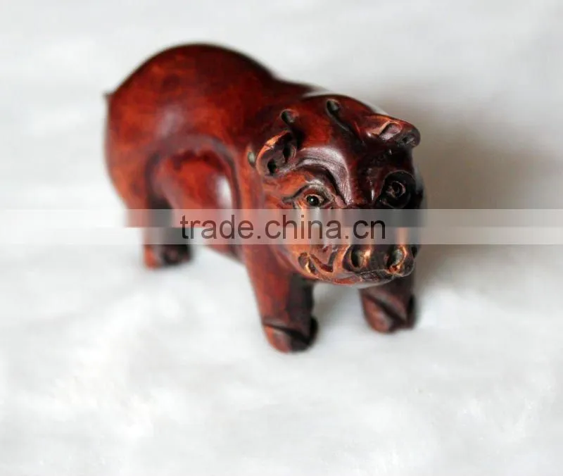 Artistic sandalwood carving pig