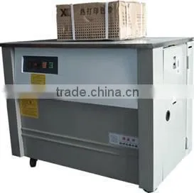 PP Strapping machine to pack boxes magazines books