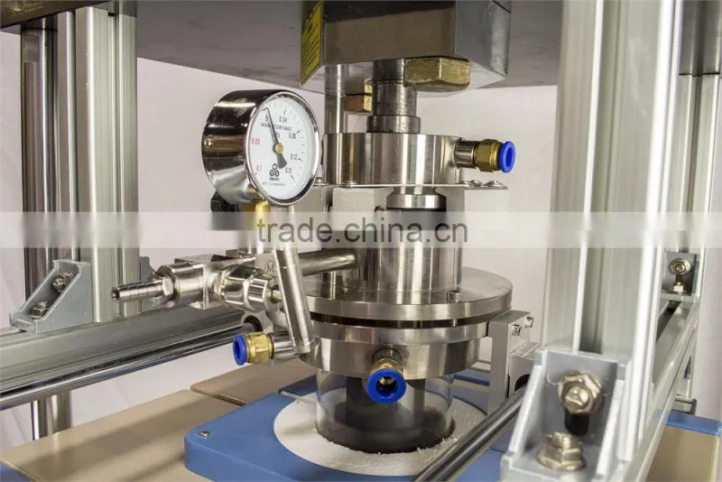 Vacuum heated pressing furnace for making dense compound materials