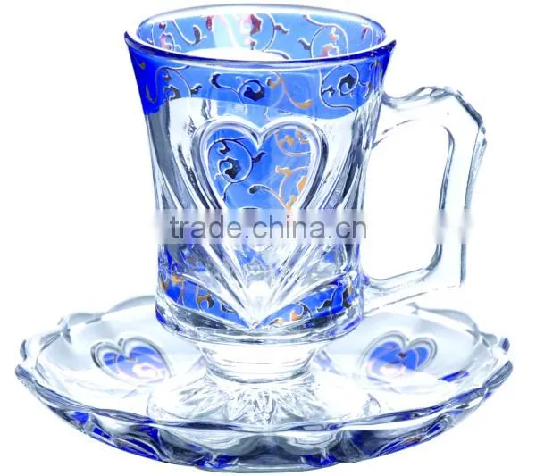 Glass coffee cups and saucers
