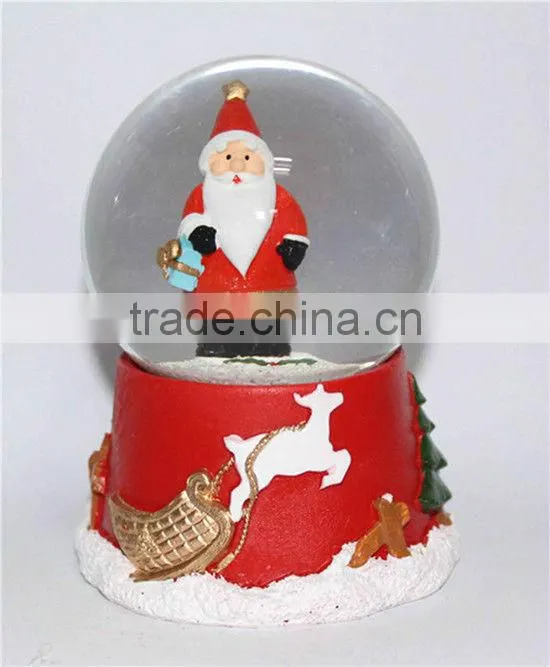 Resin Christmas lighted snow globe