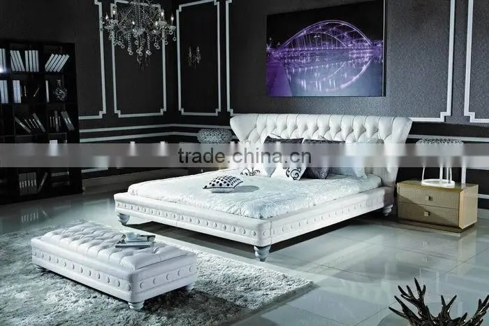 Luxury white leather bed with high headboard