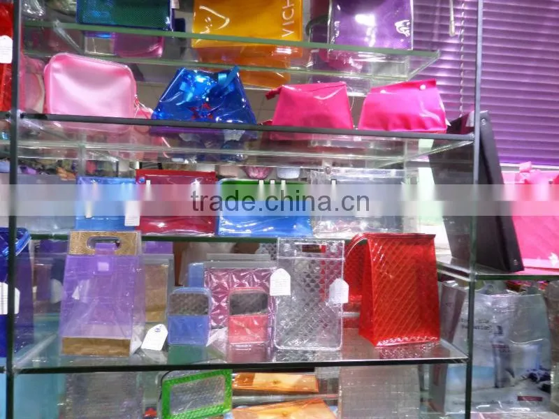red pvc cosmetic bag with metal frame