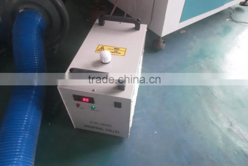 cheap beautiful design jinan Donglian laser cutting and engraving machine price for coconut shell