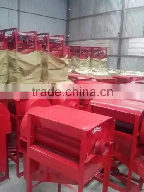 Movable mini paddy grain thresher