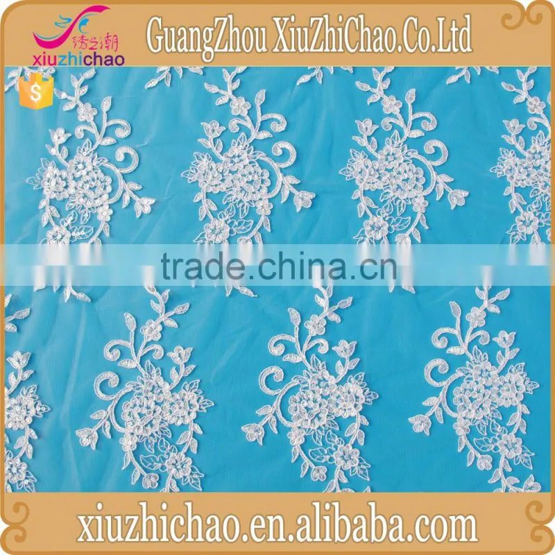 ZP0011-M (11.2)New pattern embroidered designs lace product mesh polyester ivory guipure lace fabric with sequins