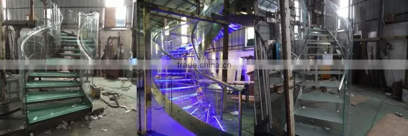 hotel lobby curved stainless steel glass staircase