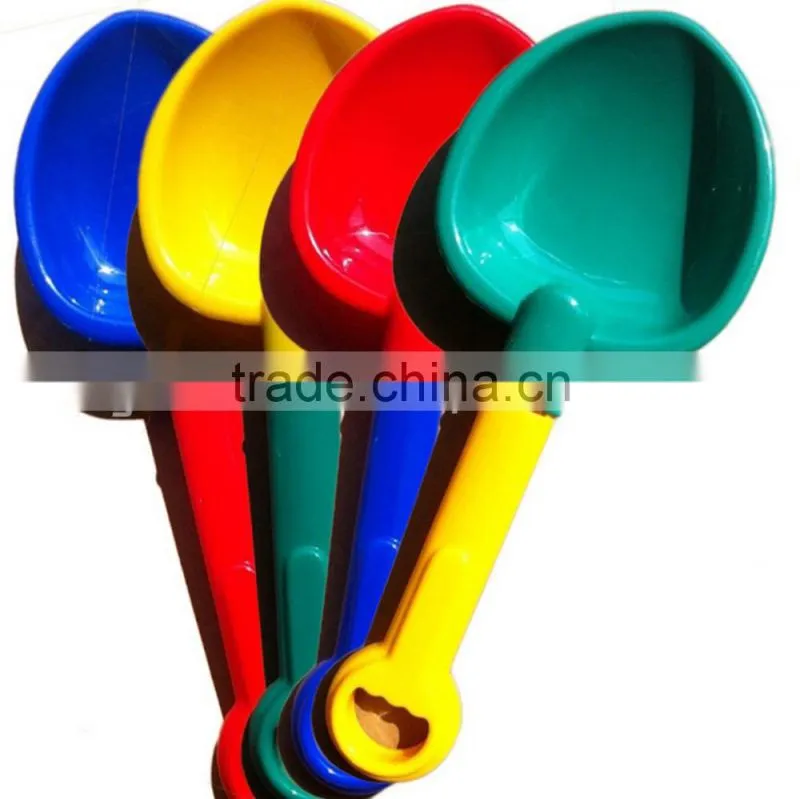 small colorful beach/snow/children plastic shovel spoon