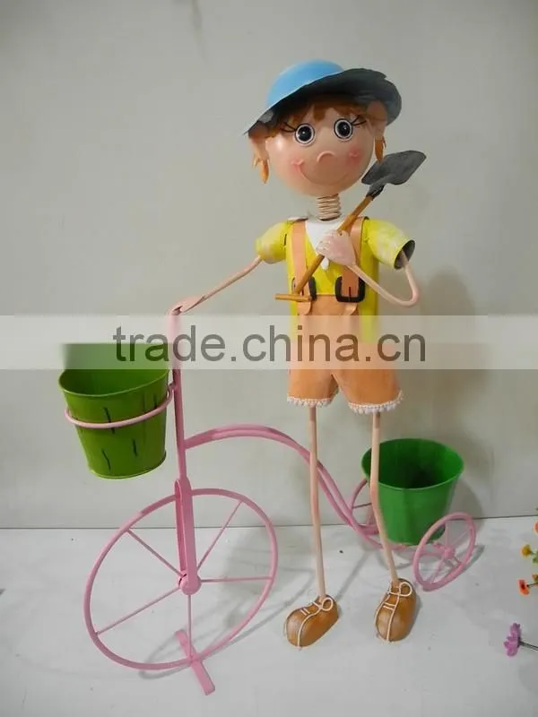 Best selling iron boy with bicycle for garden decoration