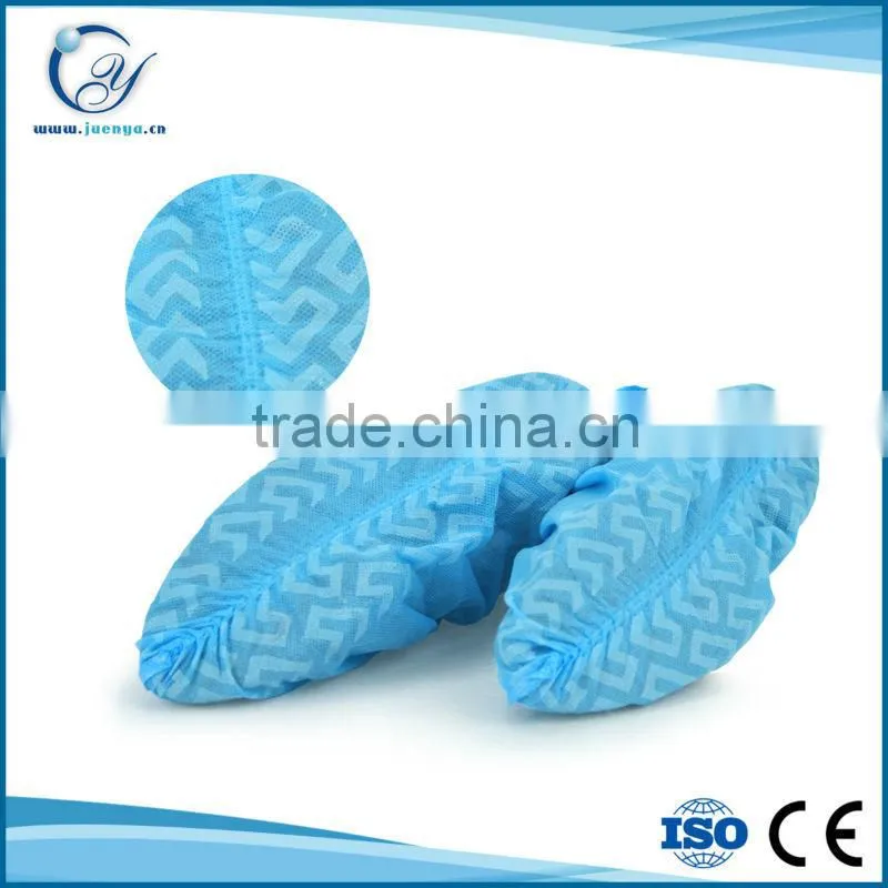 Non-skid disposable nonwoven shoe cover