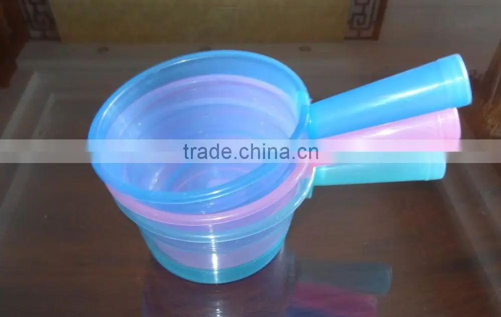 Clear plastic water ladle or soup ladle
