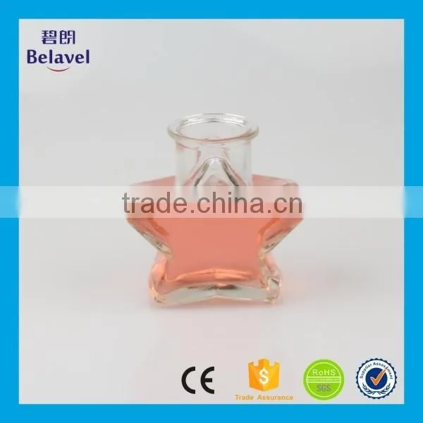 Xuzhou factory supply five star shaped cheap clear glass bottle