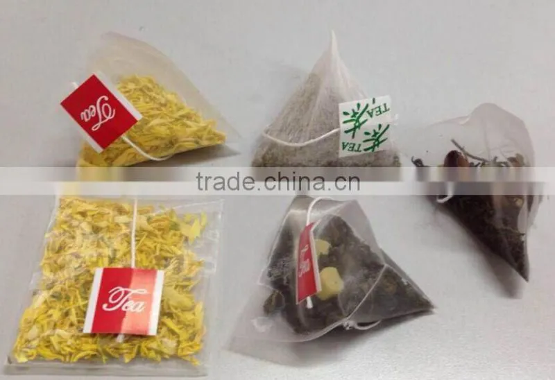 Shanghai tea filter bag packaging machine prices/tetrahedron tea bag envelopes machine /tetraheron tea bag packing machine