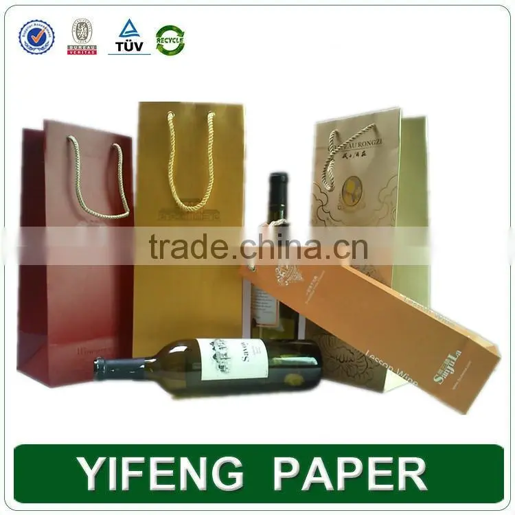China Supplier customized popular wholesale paper carrying gift wine bottle bags