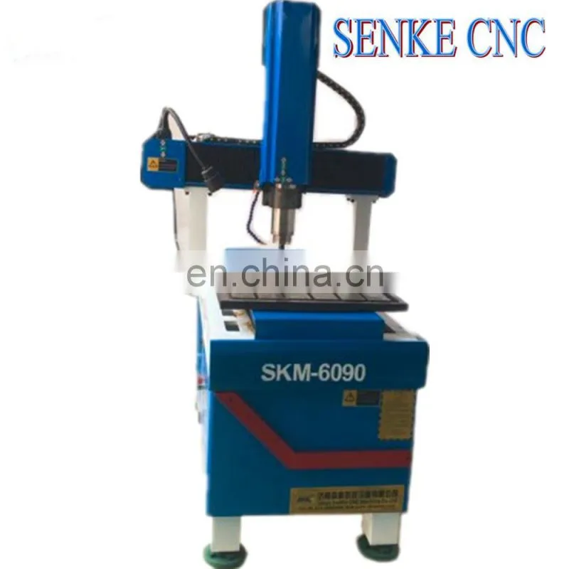 SKM-6090 Whole cast iron body metal coin engraving machine