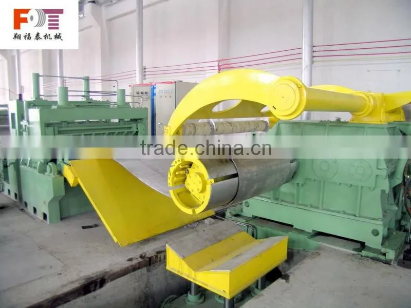 steel coil rewinder with hold down arms device