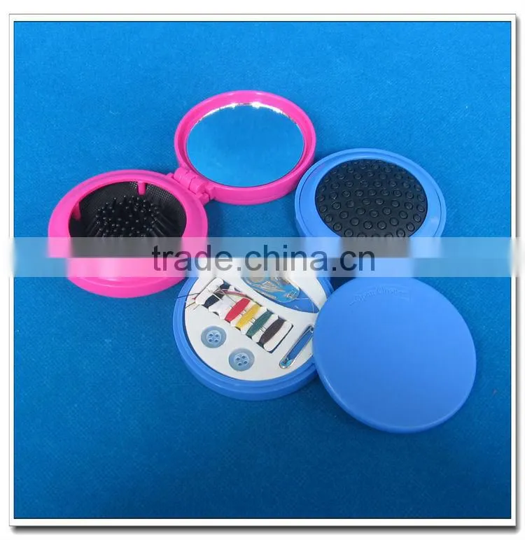 Plastic hair brush with sewing kits and mirror