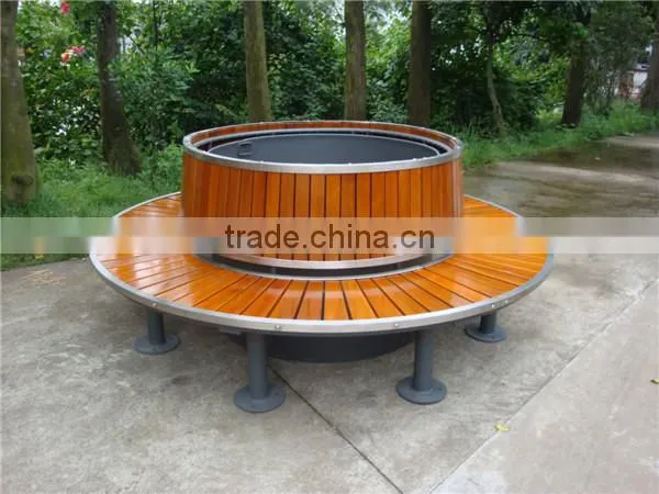 Metal round tree bench with solid wood seating