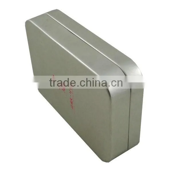 silvery rectangular tea can