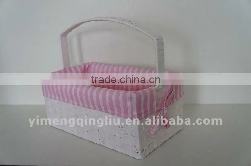 wicker storage basket with pink liners