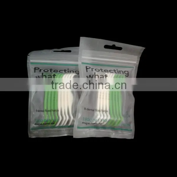 High quality plastic green and white Y shape dental floss pick