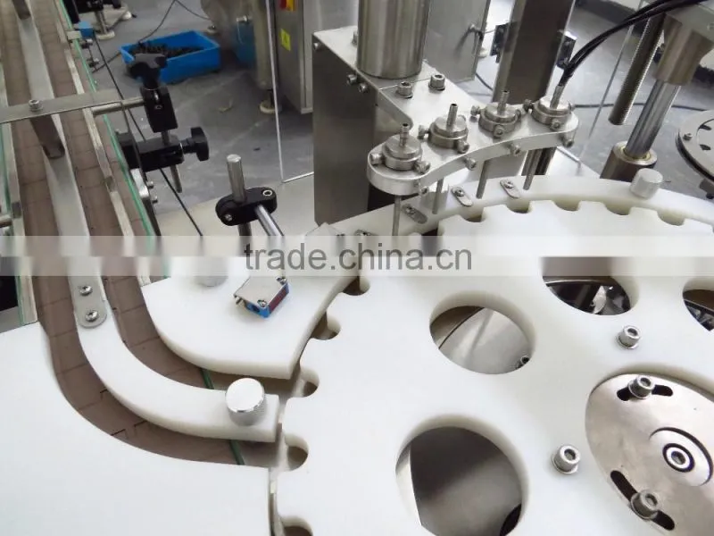 DTNX-60Y Mechanical Hand Duel Lines Eye Drop Filling, Plugging And Capping Machine