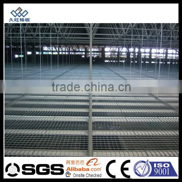 car passing road side steel bar grating