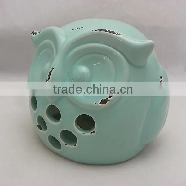 Ceramic owl shaped lanterns