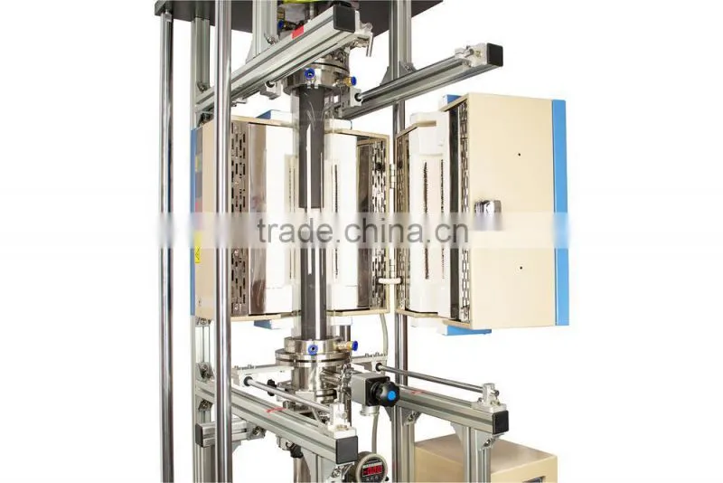 Vacuum heated pressing furnace for making dense compound materials