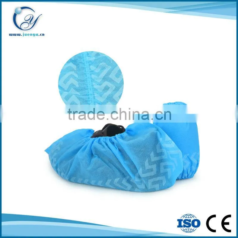 Non-skid disposable nonwoven shoe cover