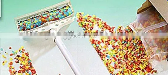 sticky lint roller with brush (Schticky)