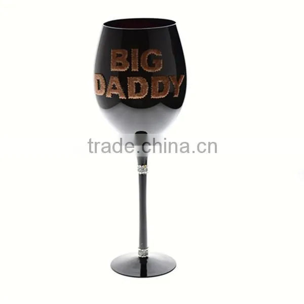 mouth blown black wine glass with decoration