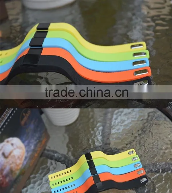 A button the TW64 smart bluetooth bracelet