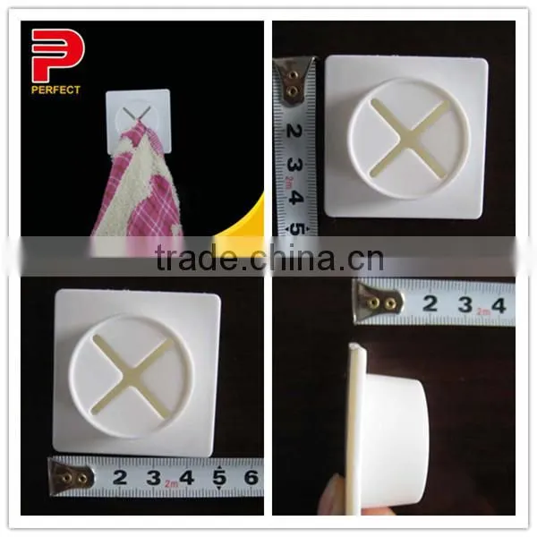 Removable self adhesive plastic towel grip