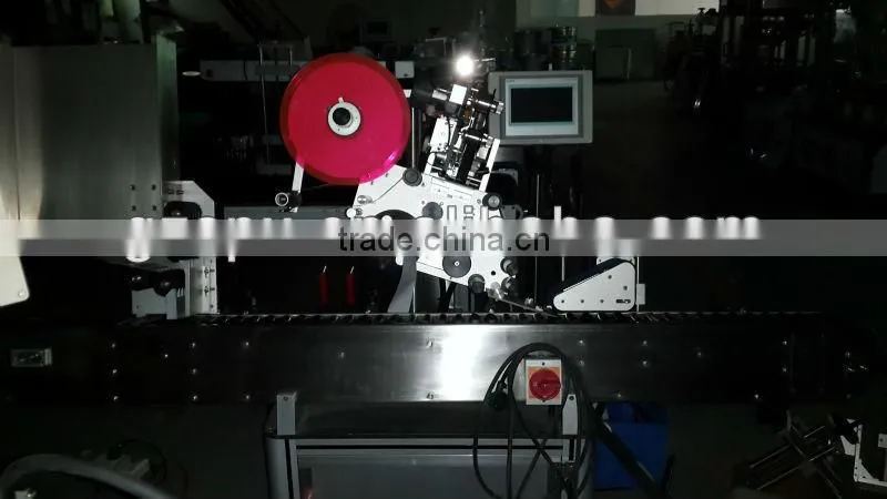 SPX Automatic top labelling machine