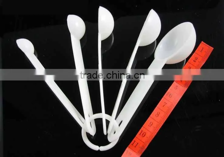 White color 5 in 1 Multi-use measuring spoon with TSP TBSP