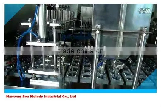 Curd cup sealing machine