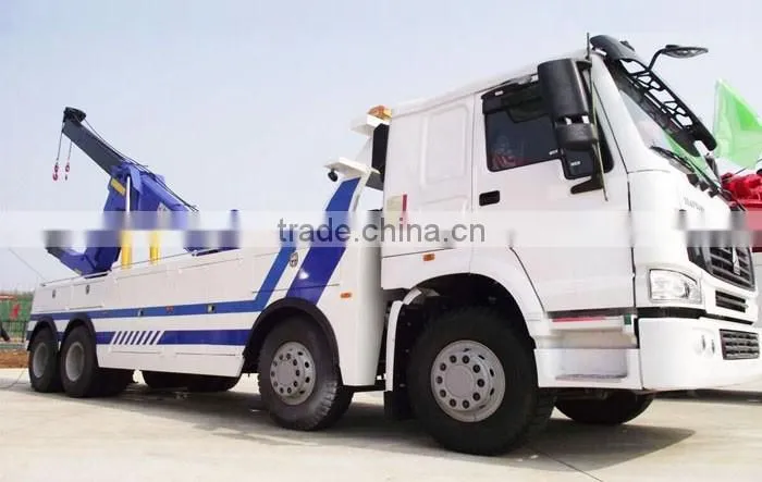 Sinotruck howo heavy duty flatbed rotator tow truck wrecker wheel lift for sale with arm crane