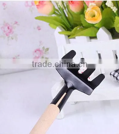 mini spade with wooden handle
