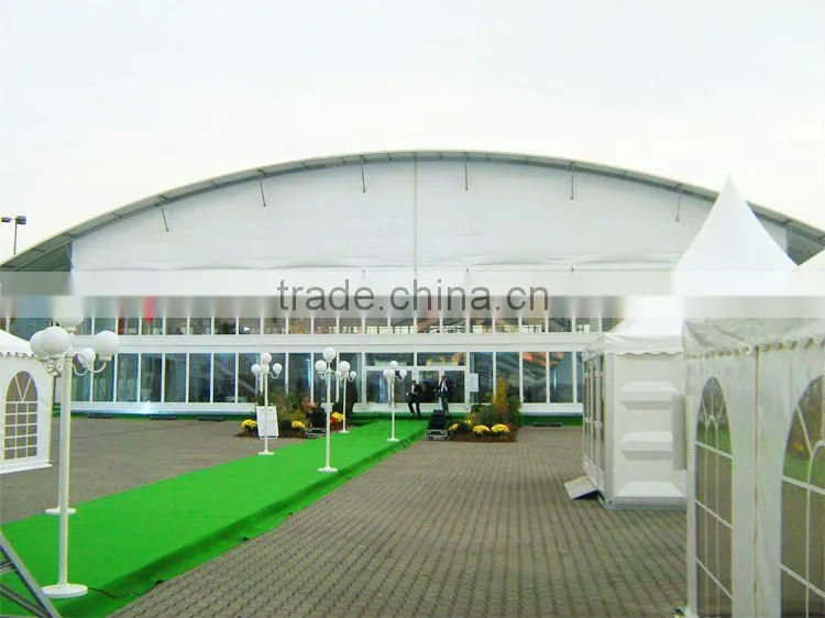 Double decker, curved roof, glass walls and flooring system