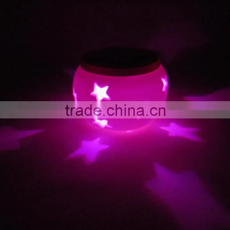 2015 New Style Ceramics Vat Shape Star Projector Solar Light